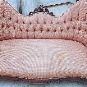 before reupholstering an antique loveseat